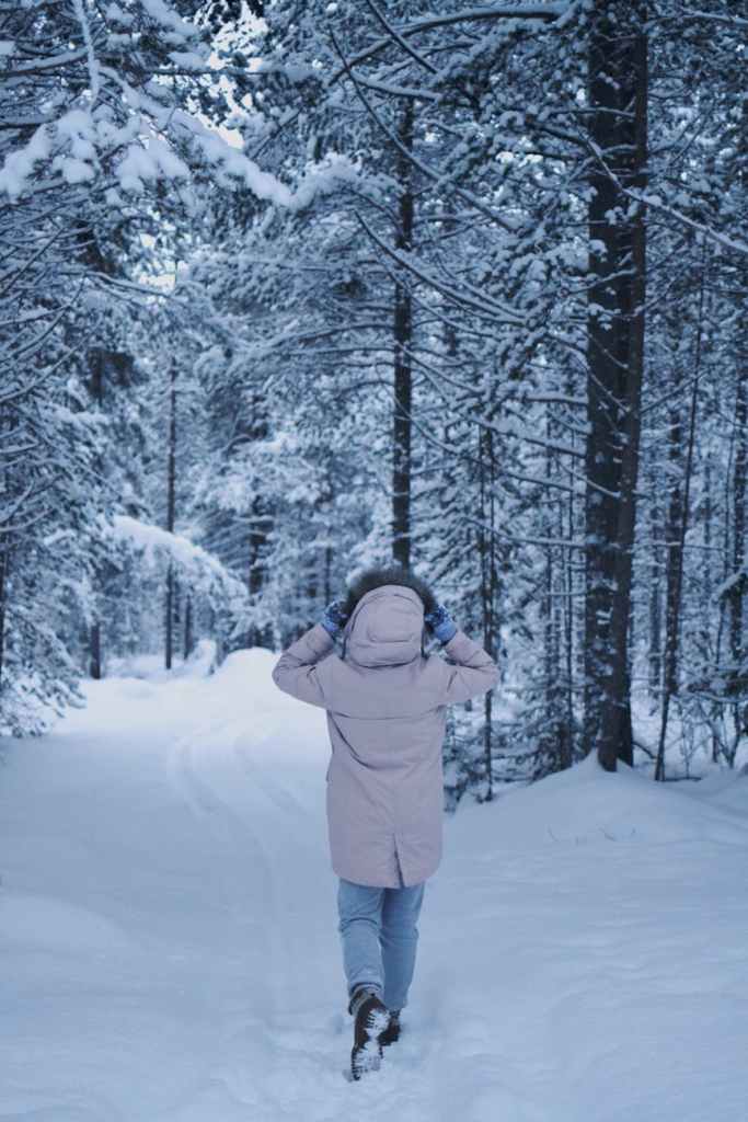 Woman going on a walk in the snow
