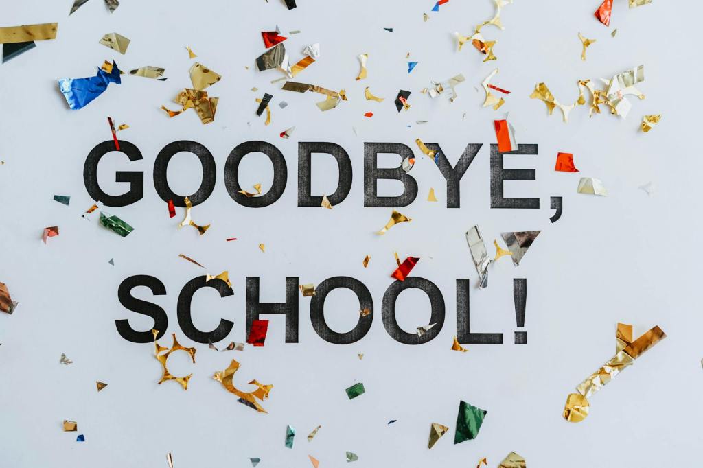 Sign that says goodbye school with confetti